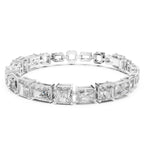 White gold lab grown diamond bracelet with rectangular and square-cut diamonds on a white background