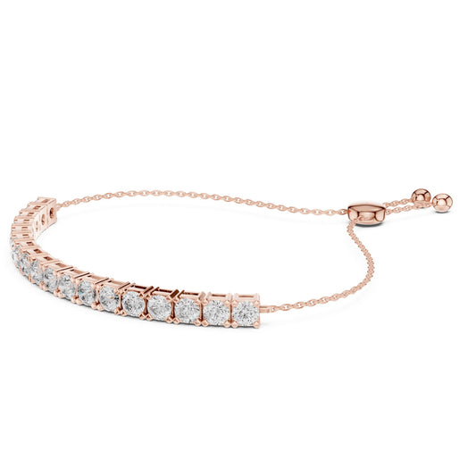 Rose gold bracelet with lab grown diamond accents on a white background
