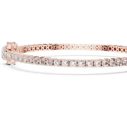 Rose gold bracelet with lab grown diamonds on a white background