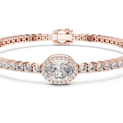 Rose gold bracelet with a lab grown diamonds on a white background