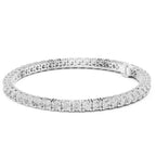 White gold and lab grown diamond bracelet on a white background