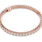 Rose gold bracelet with lab grown diamonds on a white background