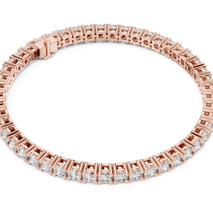 Rose gold bracelet with lab grown diamonds on a white background