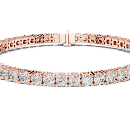 Rose gold bracelet with lab grown diamonds on a white background