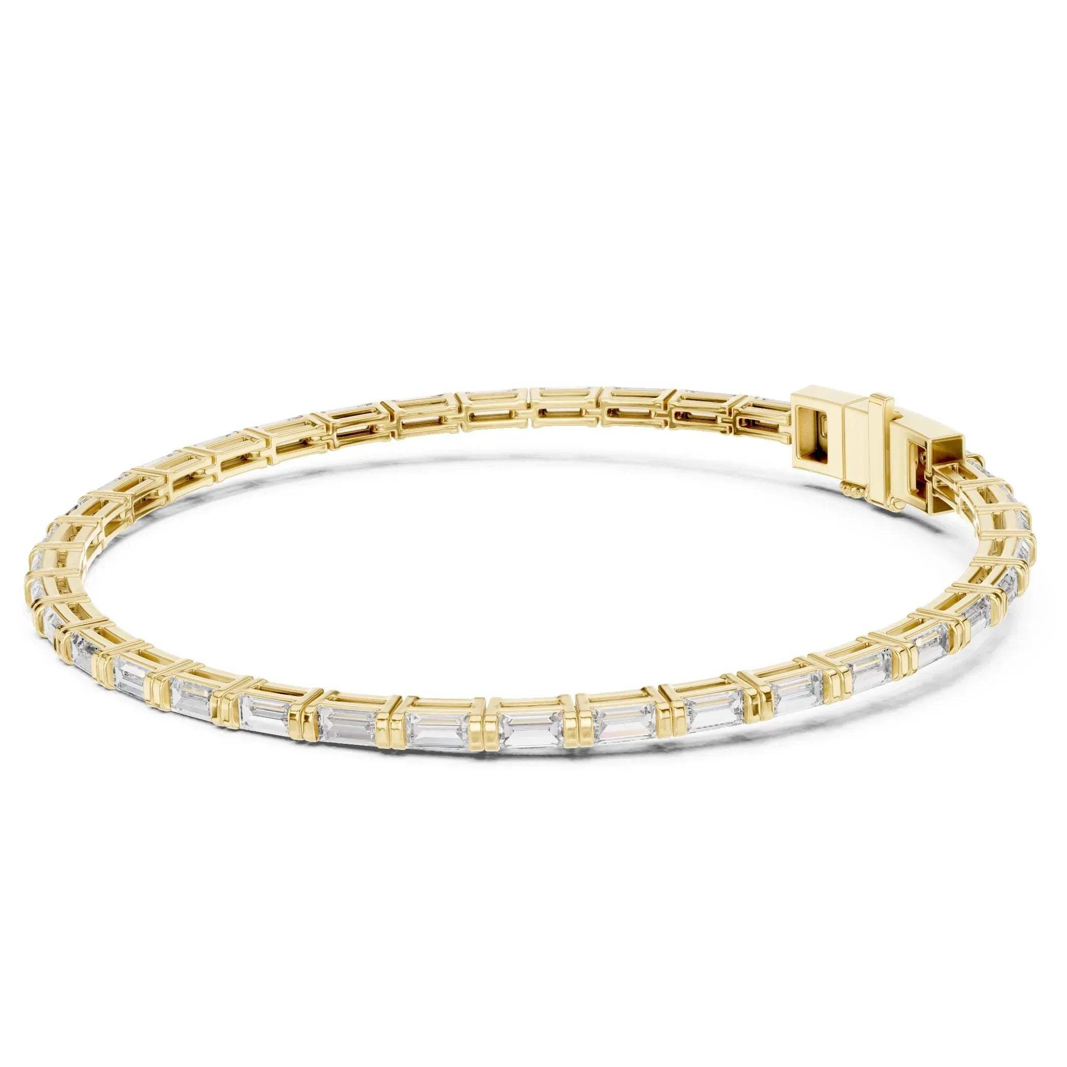 Yellow gold and lab grown diamond bracelet on a white background