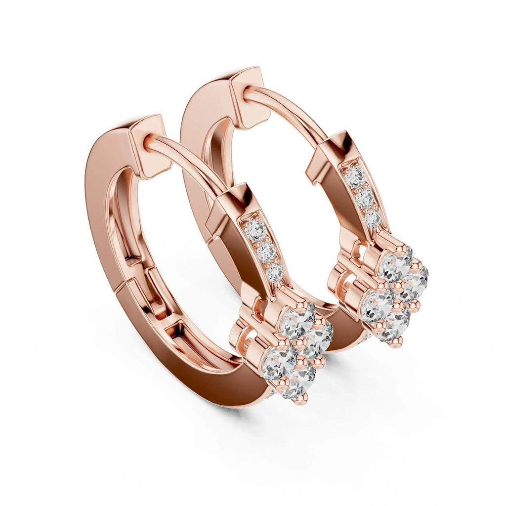 Rose gold hoop earrings with lab grown diamonds on a white background
