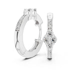 White gold and lab grown diamond earrings on a white background