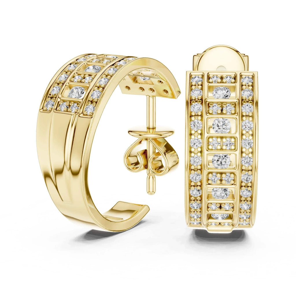 Yellow gold hoop earrings with lab grown diamond accents on a white background