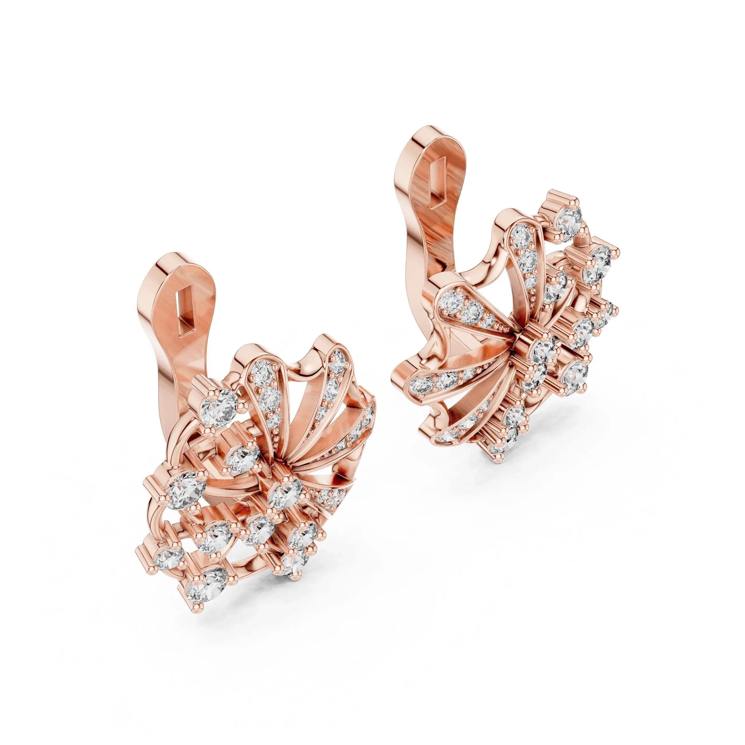 Rose gold earrings with lab grown diamond accents on a white background