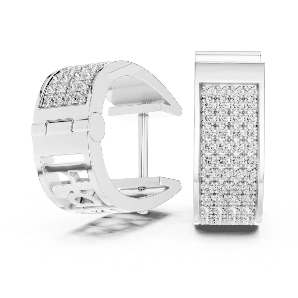 White gold earrings with clear lab grown diamonds on a white background