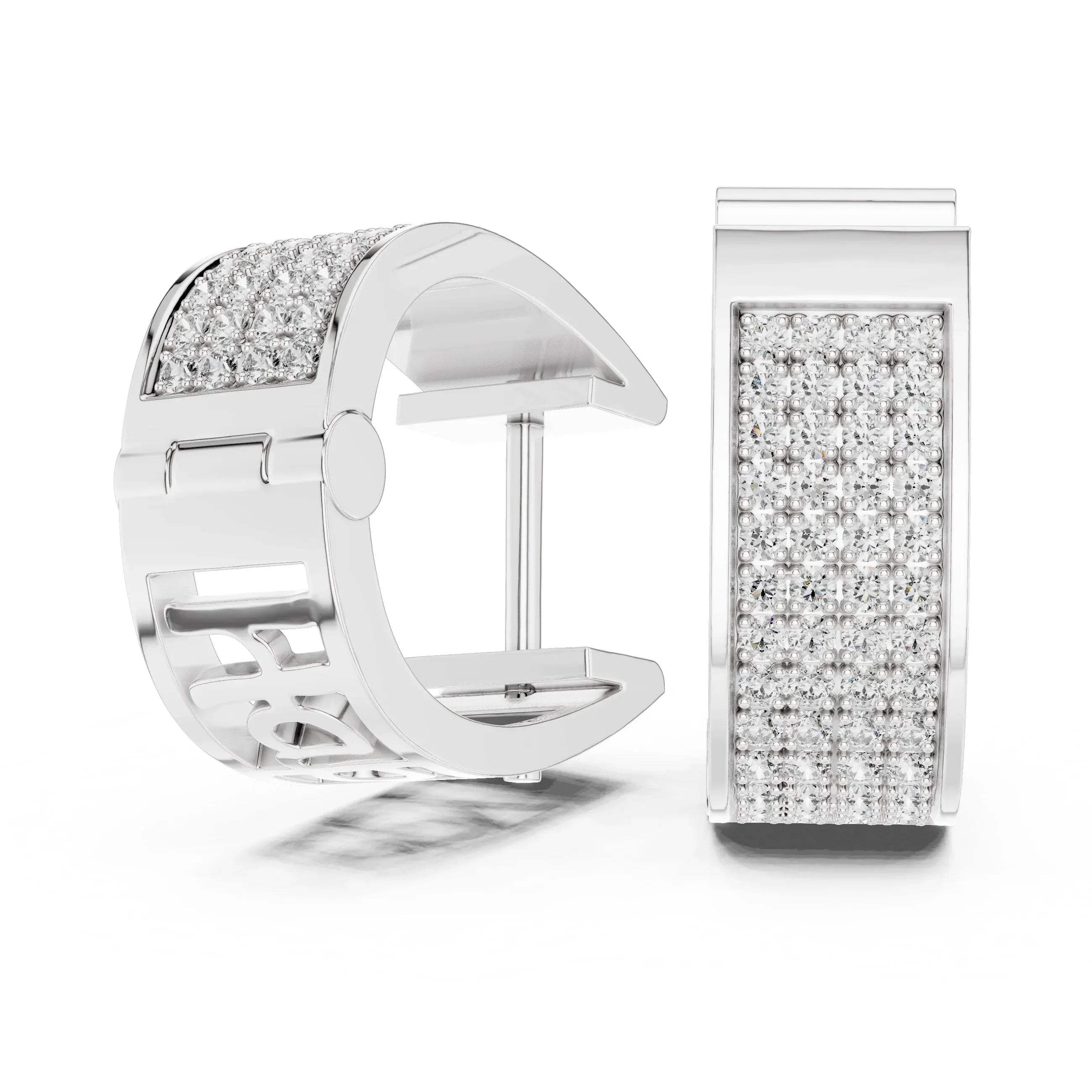 White gold earrings with clear lab grown diamonds on a white background