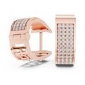 Rose gold hoop earrings with lab grown diamond accents on a white background
