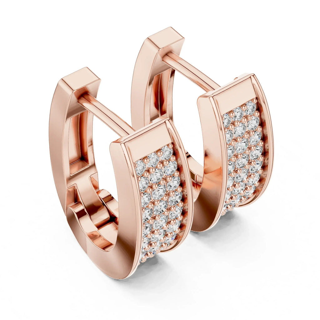 Rose gold hoop earrings with lab grown diamond accents on a white background
