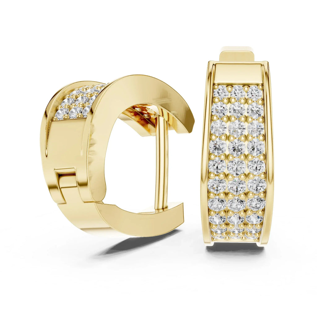Gold hoop earrings with lab grown diamond accents on a white background