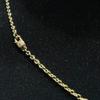 Gold chain on a black background