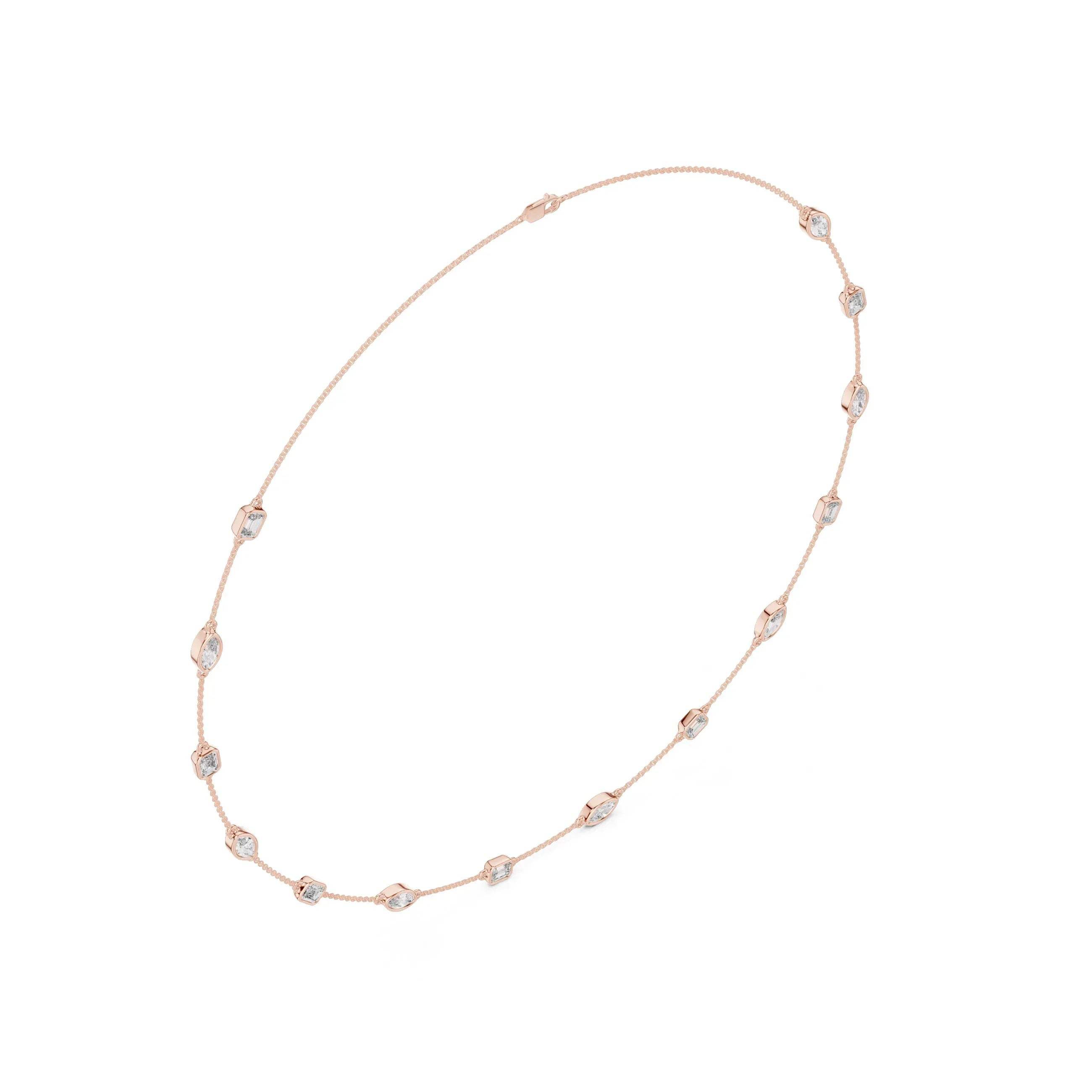 Rose gold necklace with lab grown diamonds on a white background