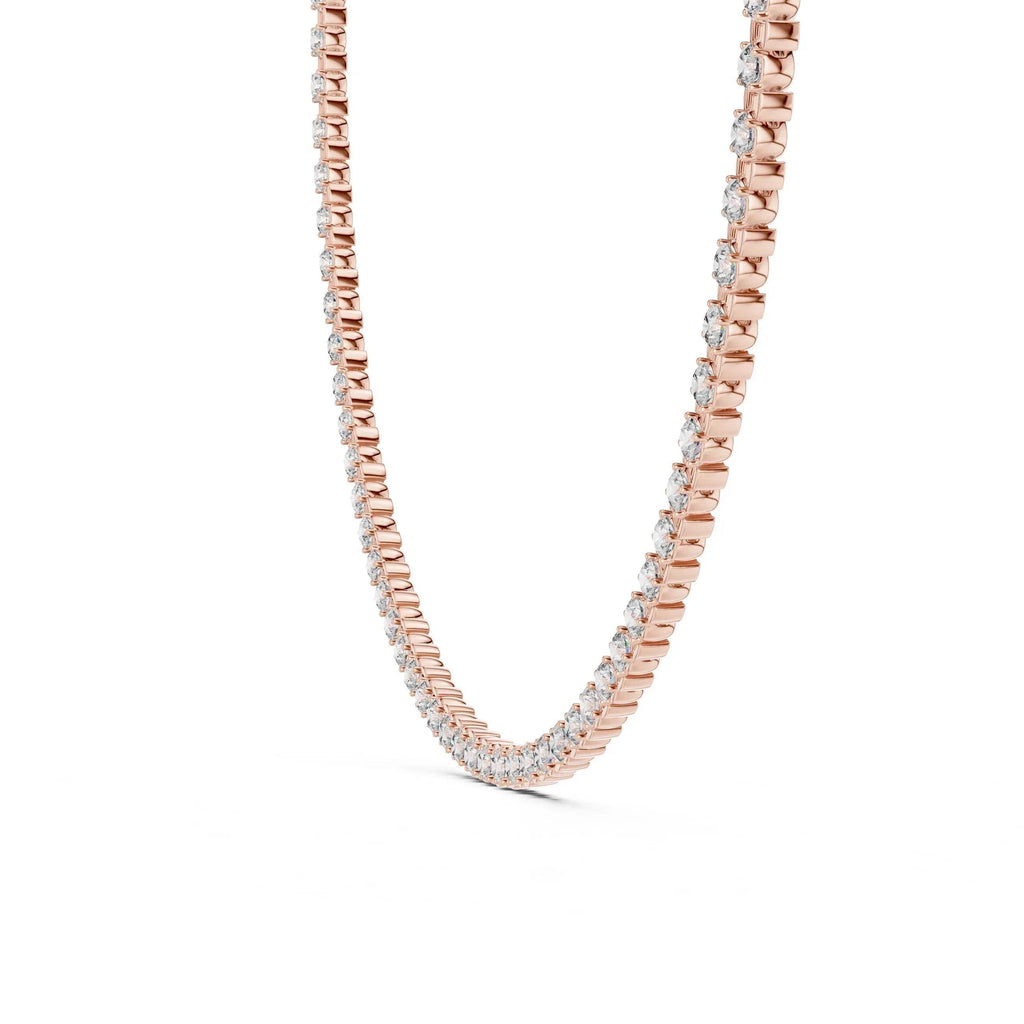 Rose gold necklace with lab grown diamonds on a white background