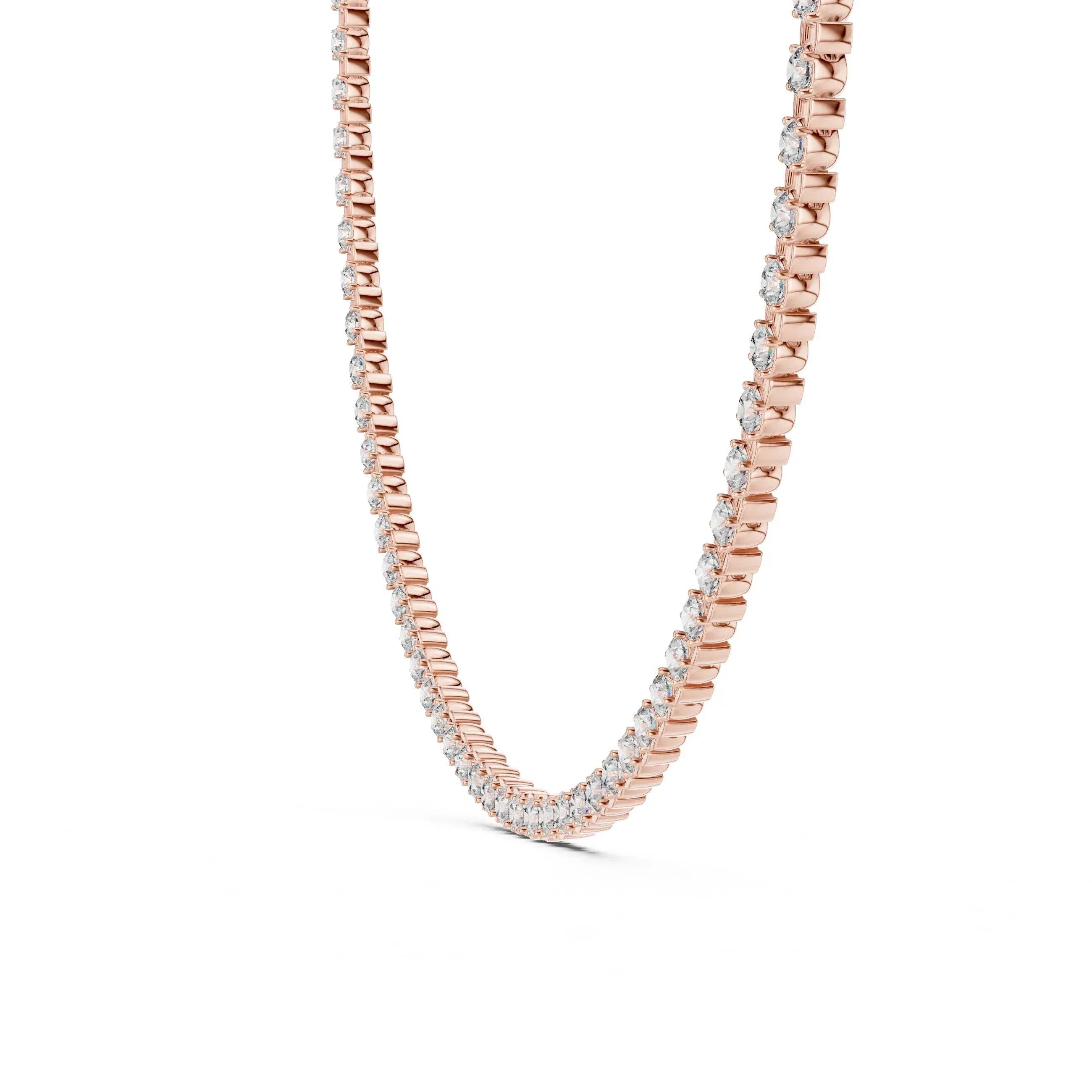 Rose gold necklace with lab grown diamonds on a white background