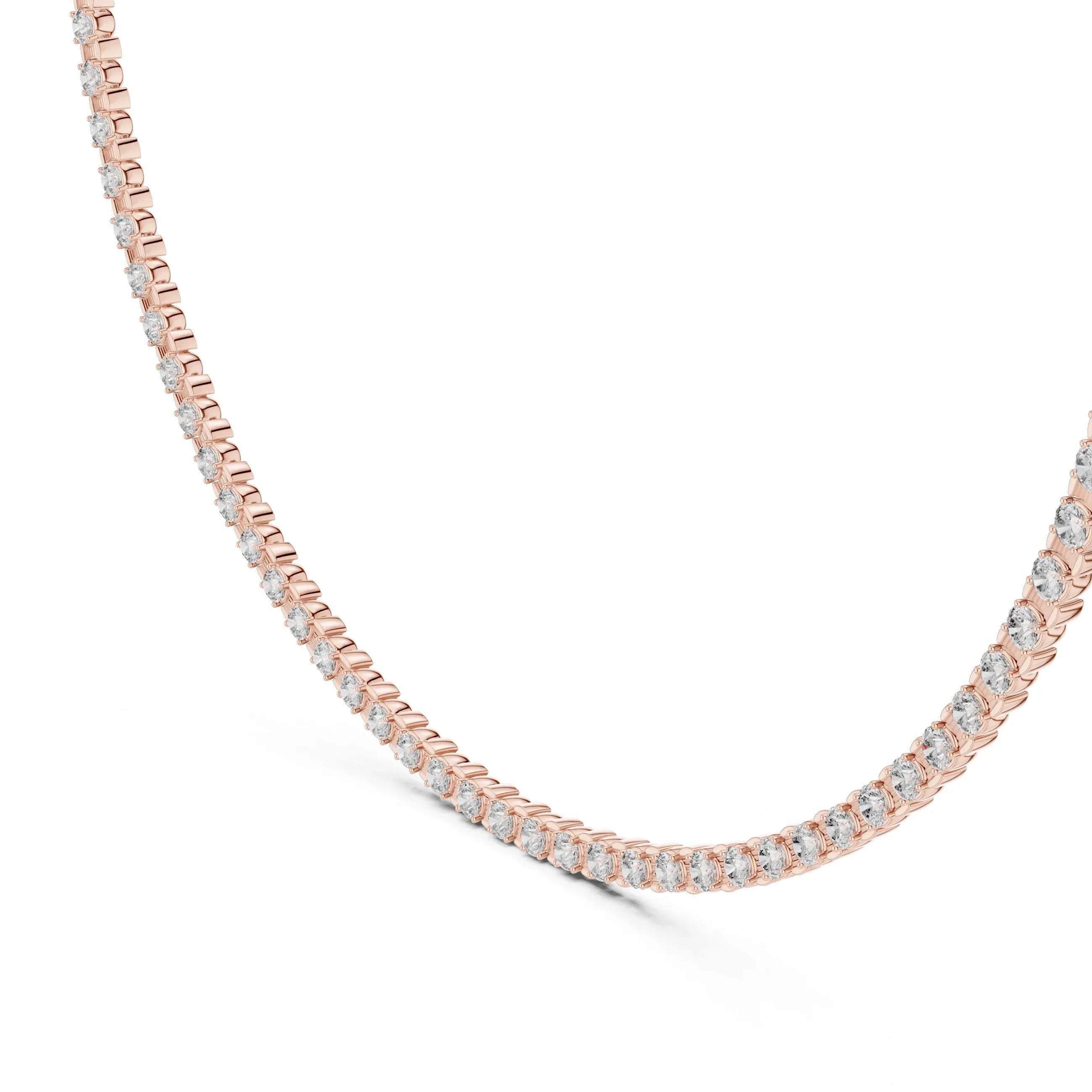 Rose gold necklace with lab grown diamonds on a white background