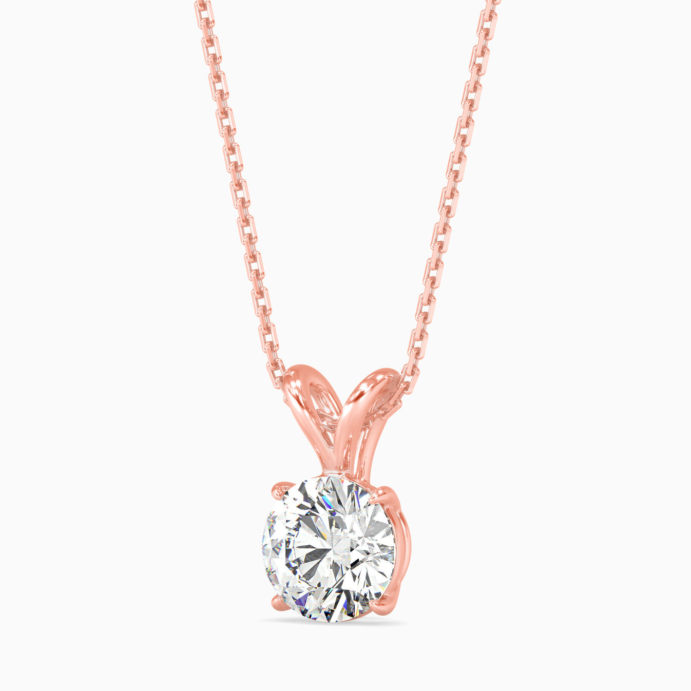 Rose gold necklace with a solitaire lab grown diamond pendant on a white background.