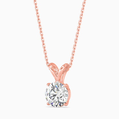 Rose gold necklace with a solitaire lab grown diamond pendant on a white background.