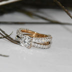 Lab grown diamond ring on a light surface with blurred background