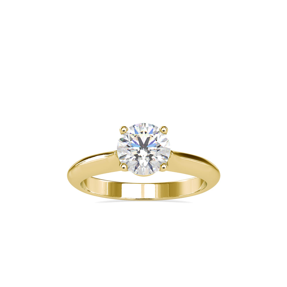 Gold ring with a solitaire lab grown diamond on a white background