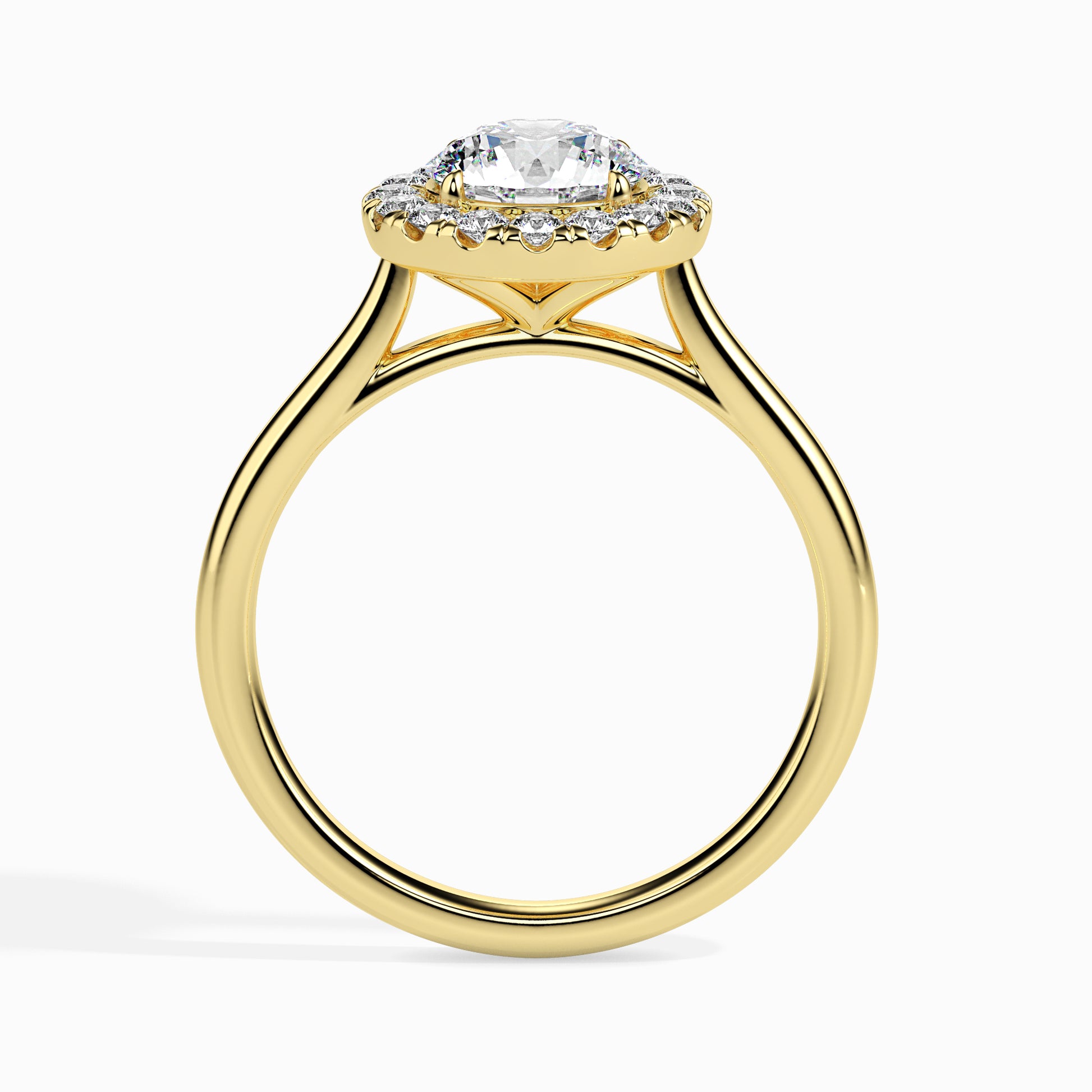 Gold ring featuring a round brilliant-cut lab grown diamond at the center, surrounded by a sparkling halo of smaller round diamonds, displayed on a light background.