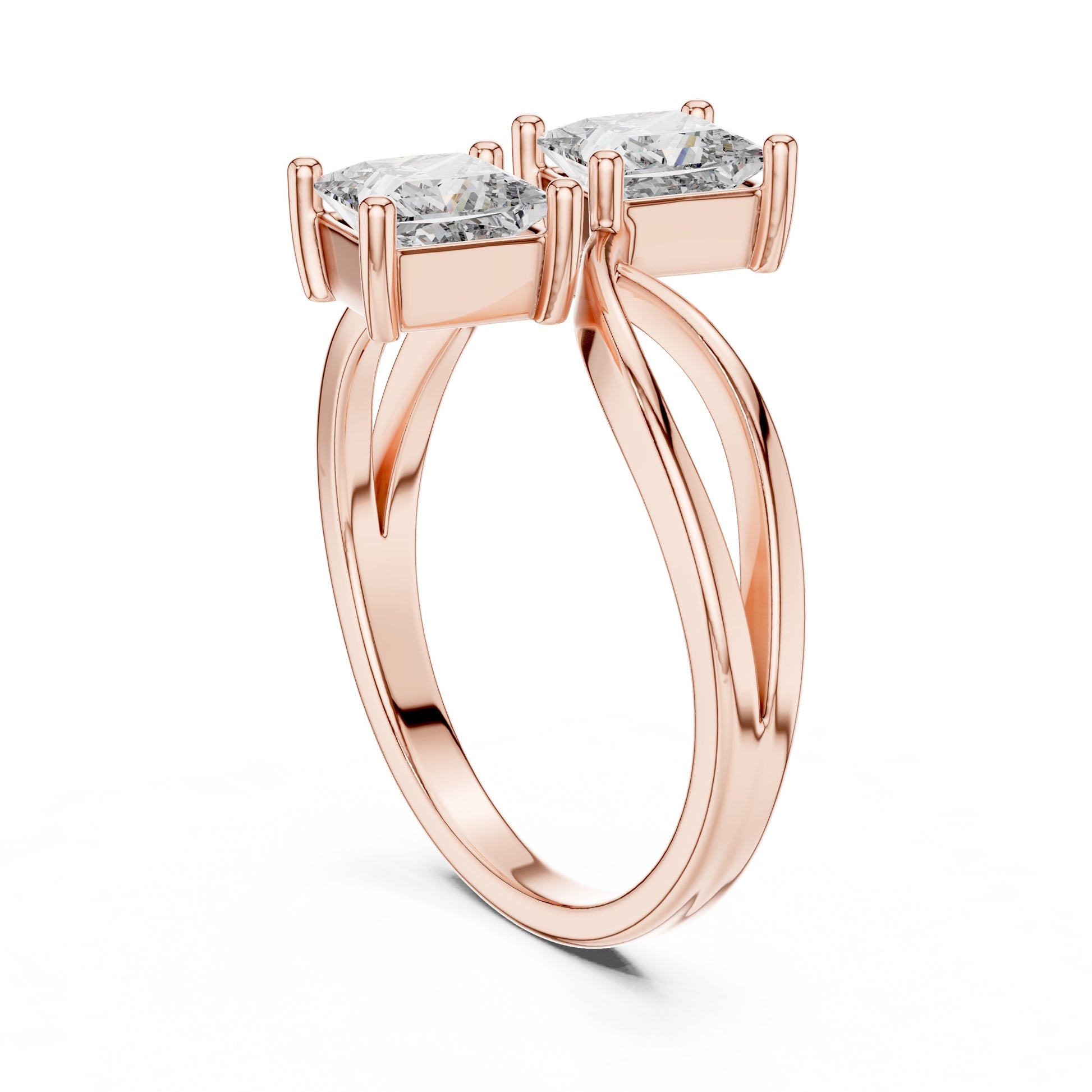 Rose gold ring with two lab grown diamonds on a white background
