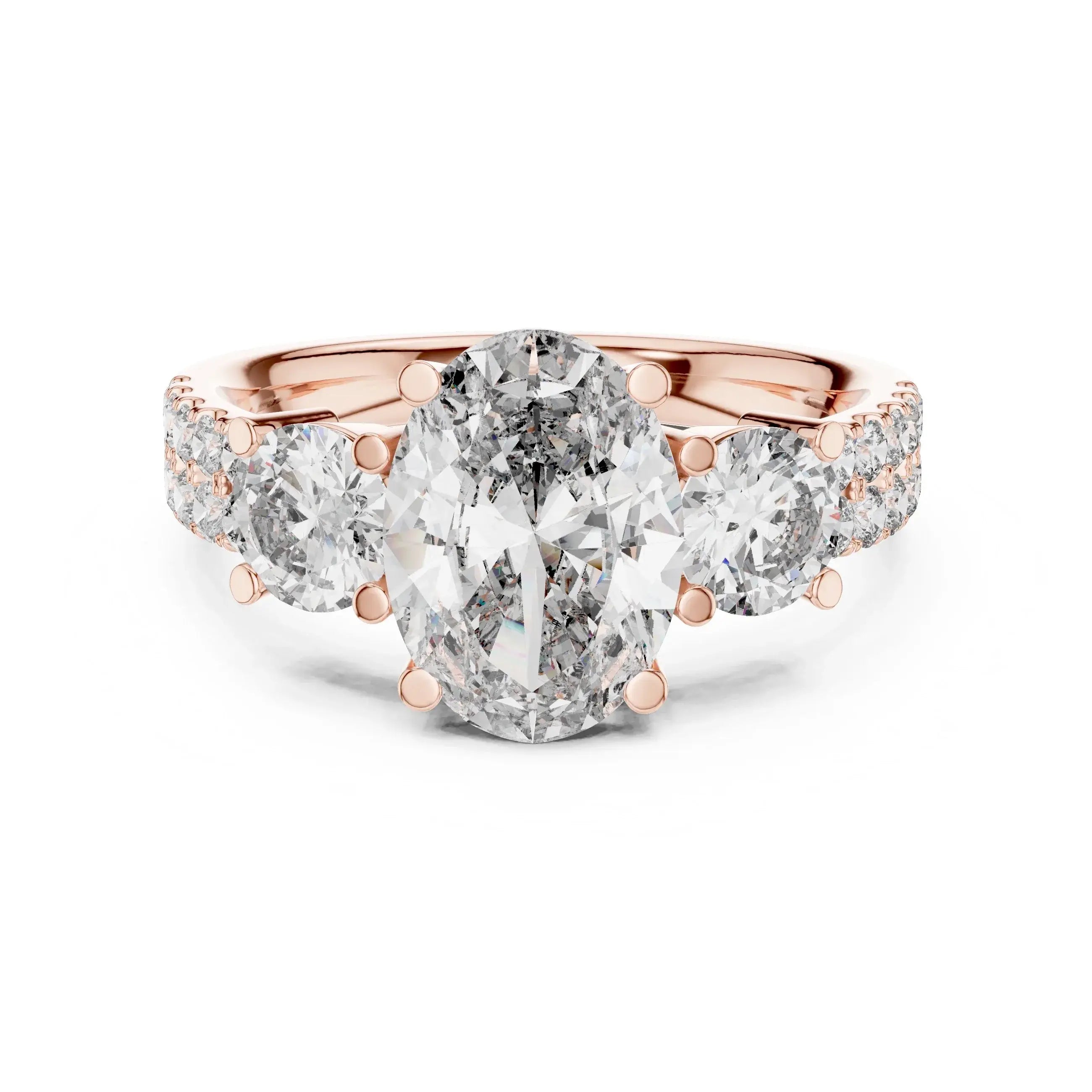 Rose gold ring with large lab diamonds and smaller diamonds on a white background