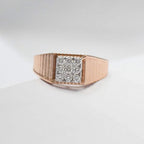 Rose gold ring with diamonds-encrusted band on a light gray background
