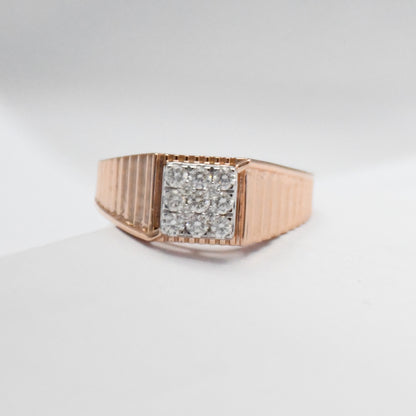 Rose gold ring with diamonds-encrusted band on a light gray background