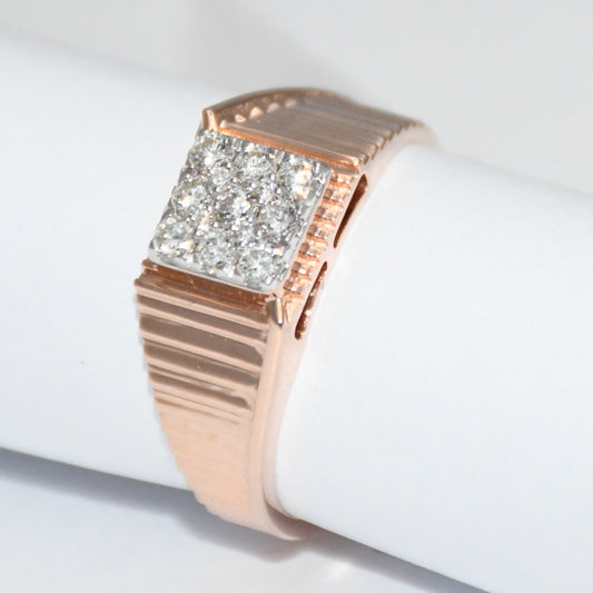gold ring with diamond accents on a white background