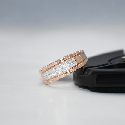 gold ring with diamonds on a gray background