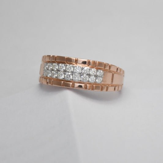 gold ring with embedded diamonds on a light gray background