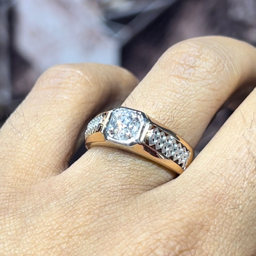 gold men's diamond ring with square solitaire and intricate lattice band detail shown on finger