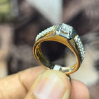 gold men's diamond ring with square solitaire and intricate lattice band detail shown on finger.