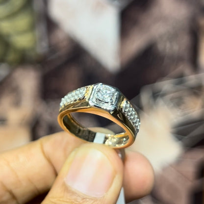 gold men's diamond ring with square solitaire and intricate lattice band detail shown on finger.
