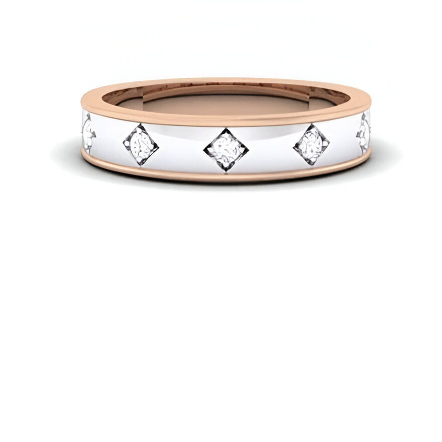 two-tone gold ring with diamond accents on a white background