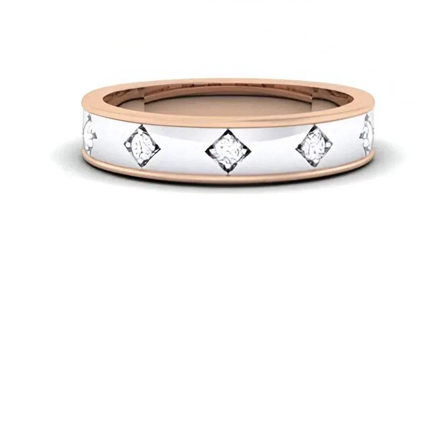 two-tone gold ring with diamond accents on a white background