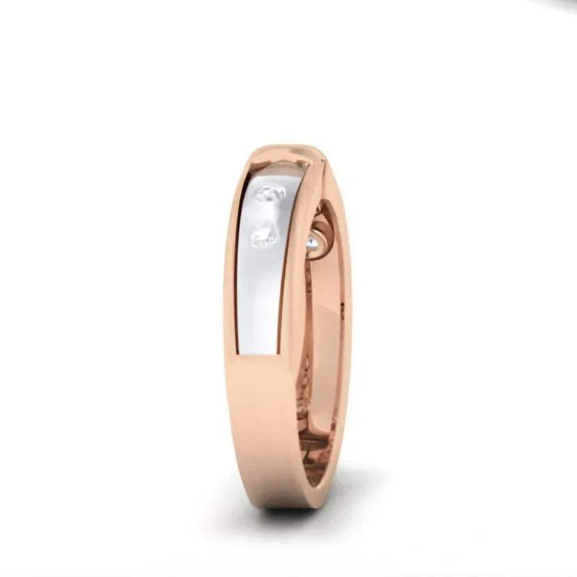 Rose gold ring with a central diamond on a white background