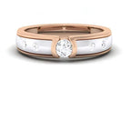 Two-tone ring with diamonds on a white background