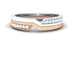 Two-tone ring with diamonds on a white background