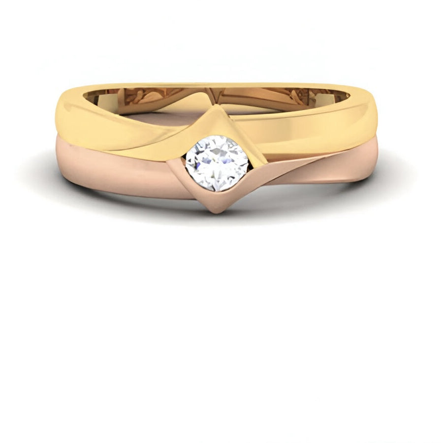 yellow gold and rose gold ring with a diamond on a white background