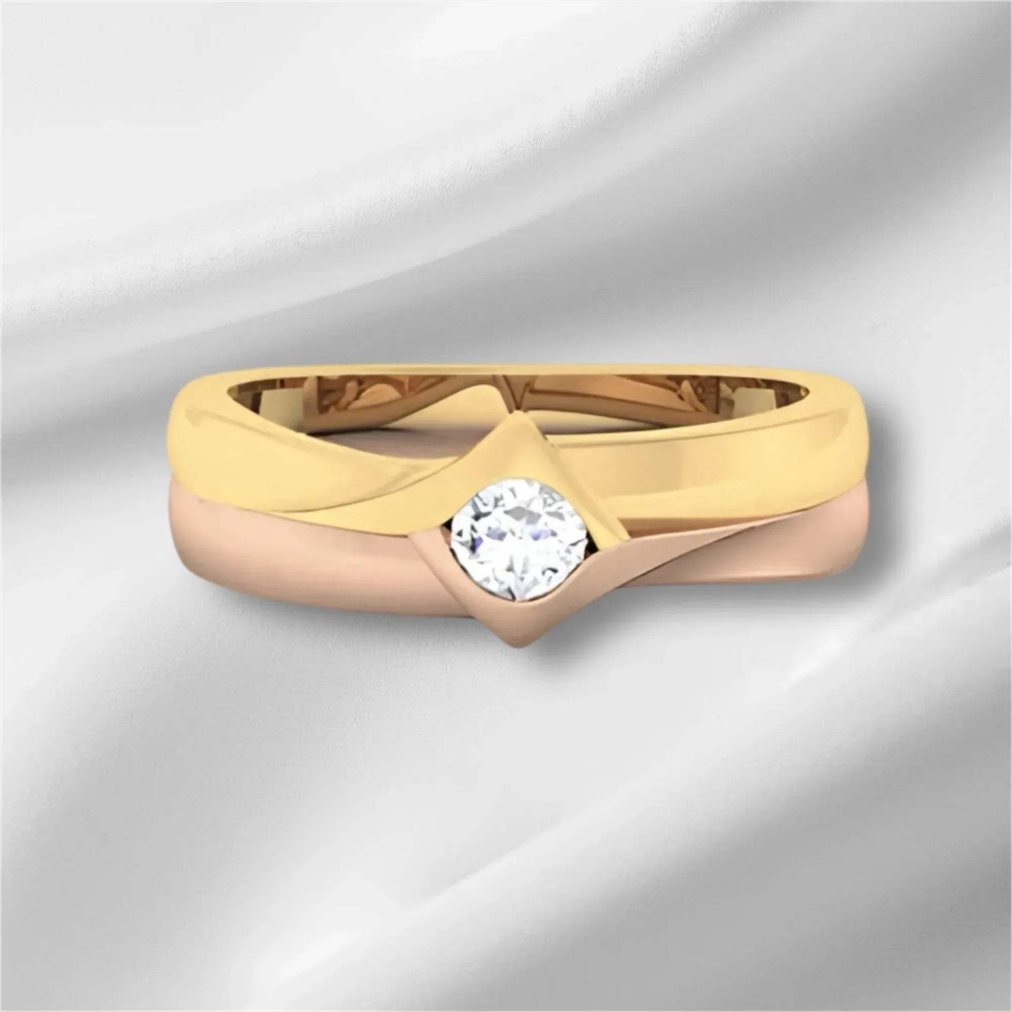 Gold ring with a diamond on a light gray background