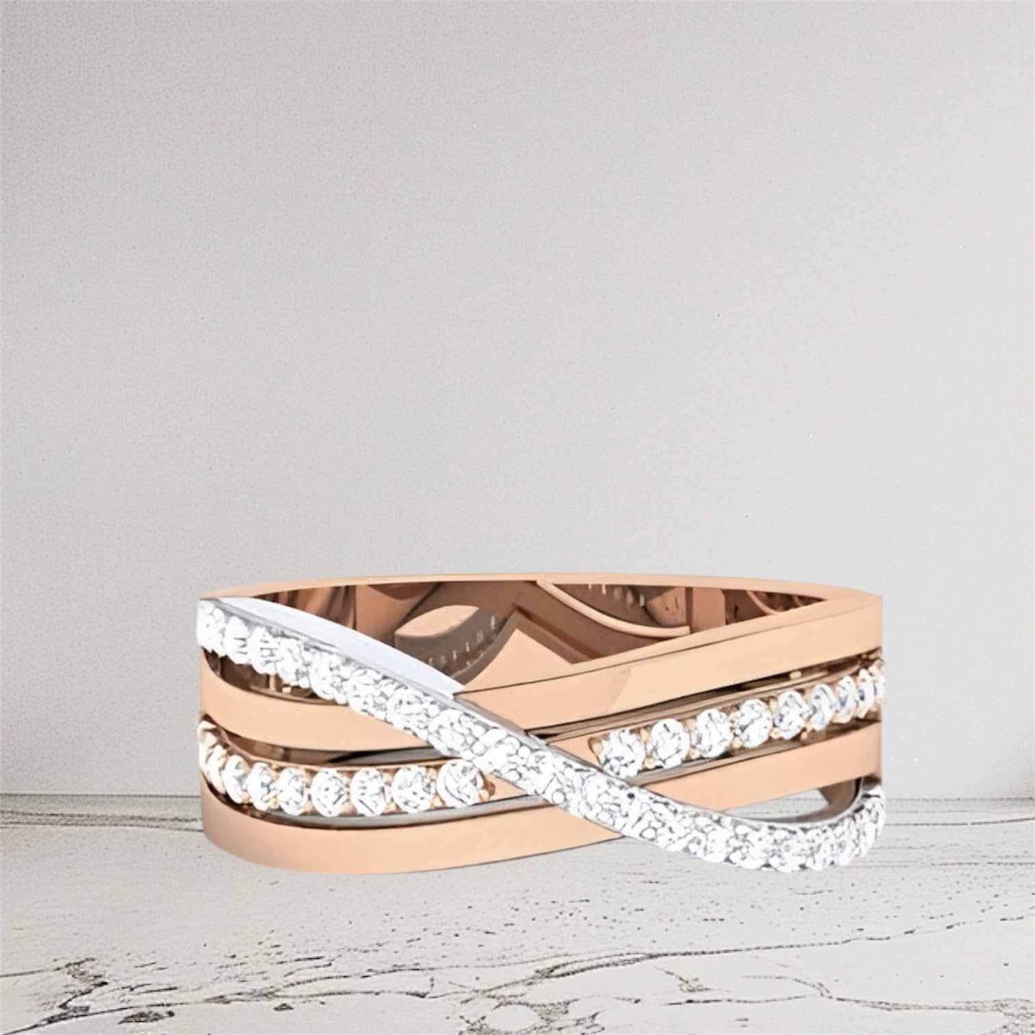 Rose gold and white gold ring with diamond accents on a light gray background.