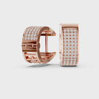 diamond hoop earrings are rotating 360 degree angle on a white surface.
