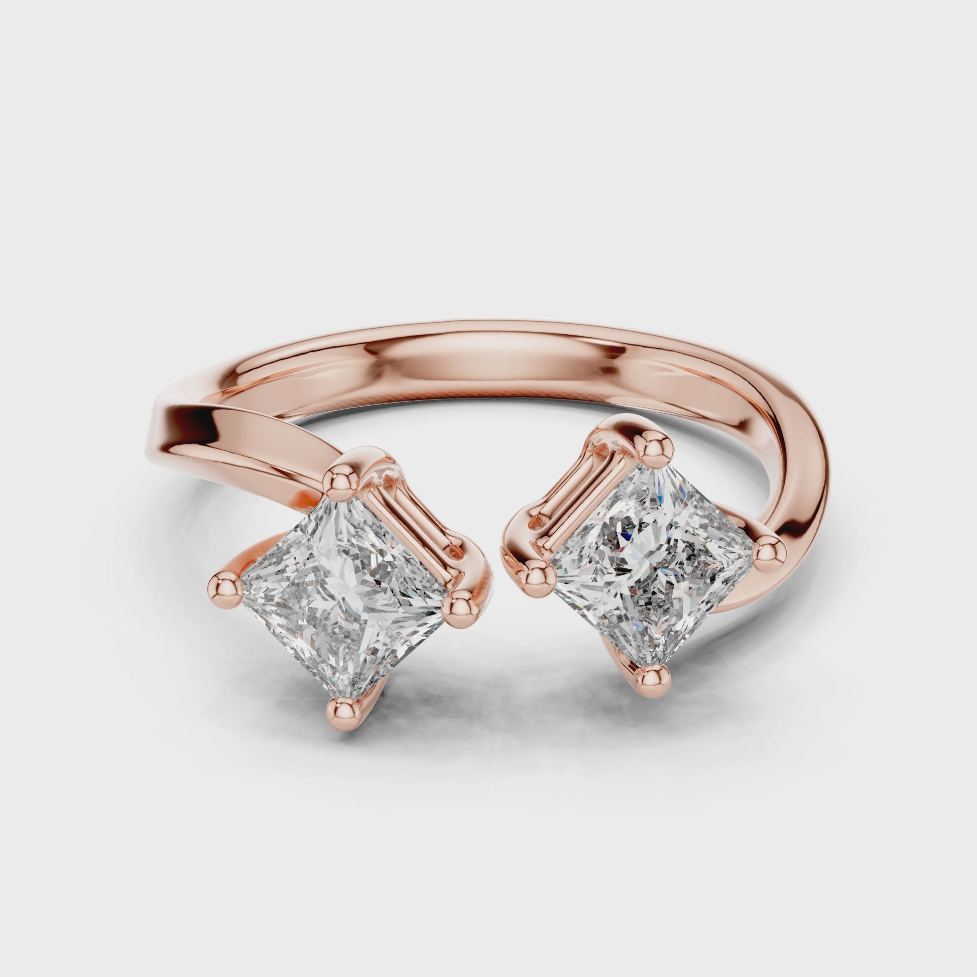 women's diamond ring in toi et moi design is shown from 360 degree angle.