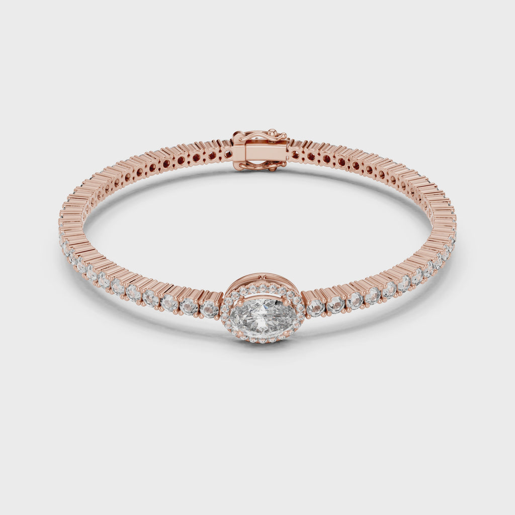 Rose gold bracelet with real diamonds is rotating parallel to the white surface.