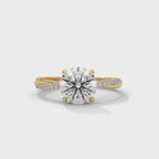 Gold and lab grown diamond ring on a white background, displayed from the 360 degree angle.